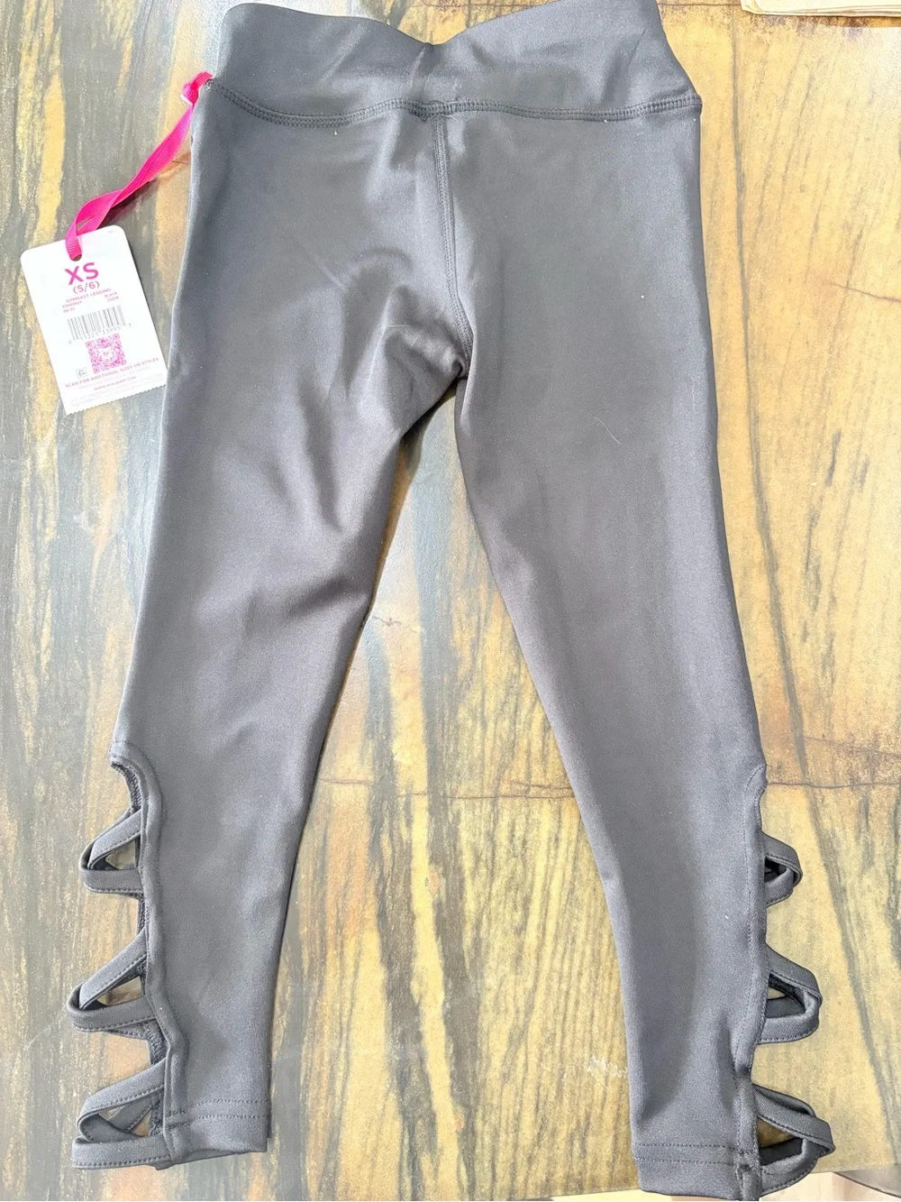 Justice Black Leggings with Pale Gold 'Gymnast' Script and Side Loop Detail
